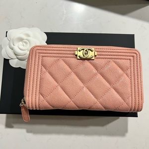 Chanel caviar quilted boy zip around wallet in pink